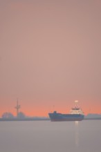 View of a ship on the Weser at sunset, Bremerhaven, Bremen, Germany
