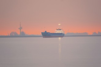 View of a ship on the Weser at sunset, Bremerhaven, Bremen, Germany