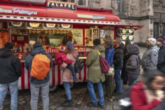People waiting at the falafel stand in front of St. Lorenz Church, Nuremberg, Middle Franconia,