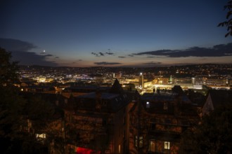 12 Sep 2018 at dusk, glowing city lights illuminate downtown with panoramic view. Stuttgart,