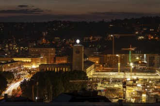 12 Sep 2018 at dusk, glowing city lights with view to central station and skyline. Stuttgart,