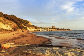 Walkers on the beach, Lido Scala dei Turchi, Realmonte, Agrigento, Sicily, south coast,
