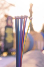 Colourful cables against a blurred background at sunset, fiberglass groundbreaking, Freudenstadt,