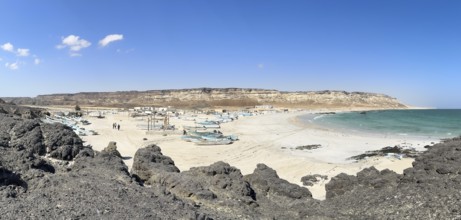 Fishing village with boats on the beach, near Ras Madrakah, Oman