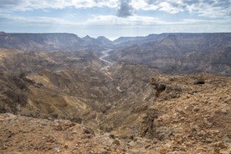 Barren mountains and gorges near Ash Shuwaymiyah, Oman