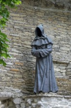 Monk sculpture, one of three bronze statues of faceless monks at the Danish King's Garden in the