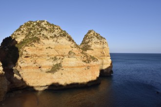 Rocky coast in evening light, Ponta da Piedade, Lagos, Algarve, Portugal