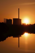 Lake in the 'Am Tibaum' nature reserve and Gersteinwerk power plant at sunrise, Hamm, North