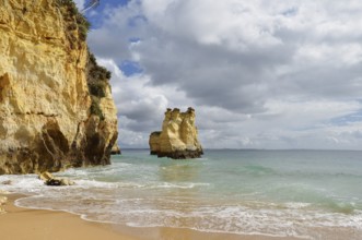 Rocky coast and beach, Praia do Pinhao, Lagos, Algarve, Portugal