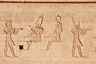 Relief of the king in front of the gods Osiris and Isis, Temple of Philae, UNESCO World Heritage