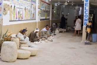 Workers and tourists in an alabaster factory, Luxor, Egypt