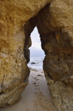 Rocky coast, rock arch, Praia do Camilo, Lagos, Algarve, Portugal