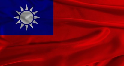 Flag of Taiwan with fabric textured background. Close up of National flag of Taiwan with realistic
