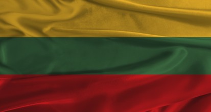 Flag of Lithuania with fabric textured background. Close up of National flag of Lithuania with