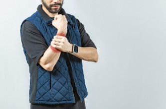 People with wrist pain isolated, Young man with pain in the hands, man with arthritis rubbing wrist