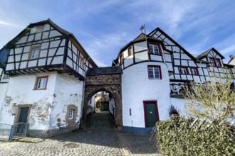 Castle gate in historic Burgbering from access to medieval Höhenburg Reifferscheid Castle Excursion