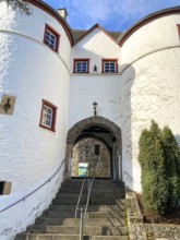 View of stairs to east gate passage into preserved inhabited bailey of medieval hill castle