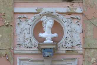 Bust of Hermes on a dilapidated 19th century house façade, Czernowicz, Ukraine