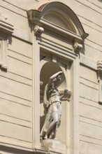 Female sculpture in a niche of a 19th century house façade, Czernowicz, Ukraine