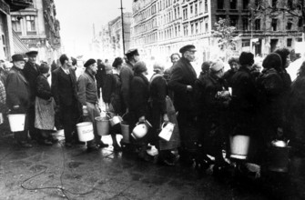 Supplying the population after surrender, civilians waiting in line to fetch water, Berlin May
