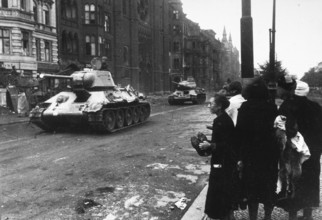 Soviet tanks at the Mehringdamm subway station, Landwehrkanal, civilians on the side of the road,