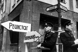 Two Soviet soldiers at the intersection between Inselstraße and Wallstraße, Berlin June 1945