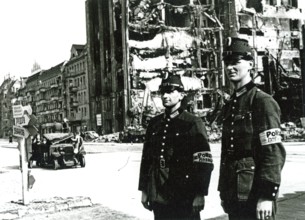 Two policemen, destroyed house, Berlin, Germany, June 1945