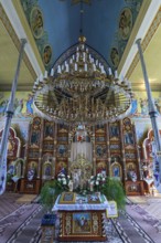 Altar room with candelabra of the former German Protestant Church today Greek Catholic, Lanivka,