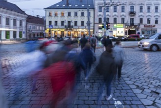 Pedestrians crossing a road, motion blur, Lviv, Ukraine
