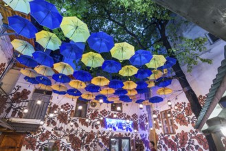 Umbrellas as decoration in a courtyard of a restaurant, Czernowicz, Ukraine