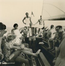 Historical photo summer 1961, tourists, beach, Rimini, Italy