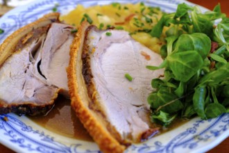 Roast pork with potato salad, Erlebnisgaststätte Erlensee, near Schechen, Upper Bavaria, Bavaria,