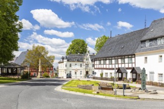 Market square with post mile column in Bärenstein, Altenberg, Eastern Ore Mountains, Saxony,