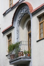 Decorated window on a house in Hübschmannstraße, Art Nouveau villas and Wilhelminian era buildings