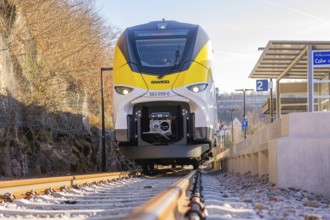 Modern train viewed from the front, under bright sunshine, test run on the new Hermann-Hesse