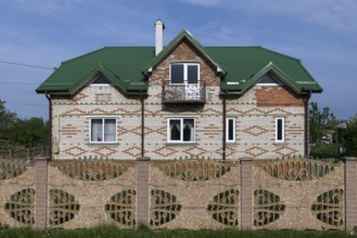 New settler house with garden fence in the former Dornfeld from 1789-1939, today Ternopillya,
