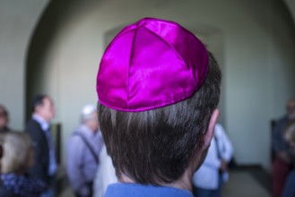 Visitor with a kippah in a synagogue, Ukraine