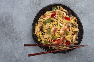 Fried noodles with chicken meat and vegetables, Bami Goreng, Indonesian dish, no people
