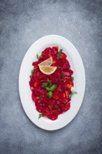 Salmon gravlax with beetroot, Scandinavian snack, beet gravlax, lightly salted fish, homemade, no