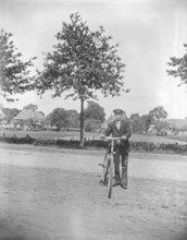 Man with bicycle, cyclist, ca. 1920-1930, retro, vintage, old, historic, northern Germany