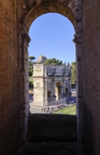 View through round arch of Constantine's Arch from the Colosseum, Rome, Lazio, Italy