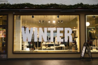 Shop window with the inscription Winter, Helsinki, Finland