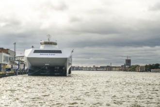 Large Stena Line fast ferry catamaran ferry in Gothenburg harbour under cloudy sky, Gothenburg,