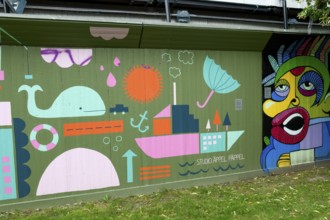 Colourful wall mural with ship, whale and creative patterns, modern art street art, Gothenburg,