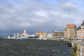 River view on Götaälv in Gothenburg harbor with Lilla Bommen in cloudy sky, Gothenburg, Västra