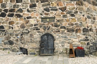 Detail of an old stone wall stone tower in Gothenburg's Skansen Kronan fortress with historical