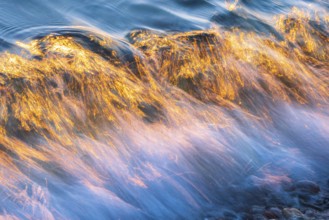 Wave play at sunrise on the chalk coast in Jasmund National Park, Rügen, Sassnitz,