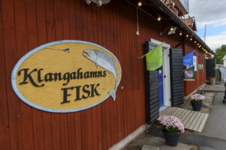 Rustic fish shop Klangahamns Fisk with decorative elements and wooden walls, Sjötorp, Västra