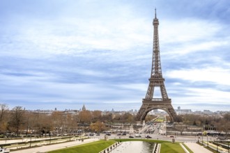 Eiffel tower rising above trocadero gardens, iconic paris skyline and historic monument framed by