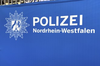 Press photo of the logo and lettering Police of North Rhine-Westphalia, Germany